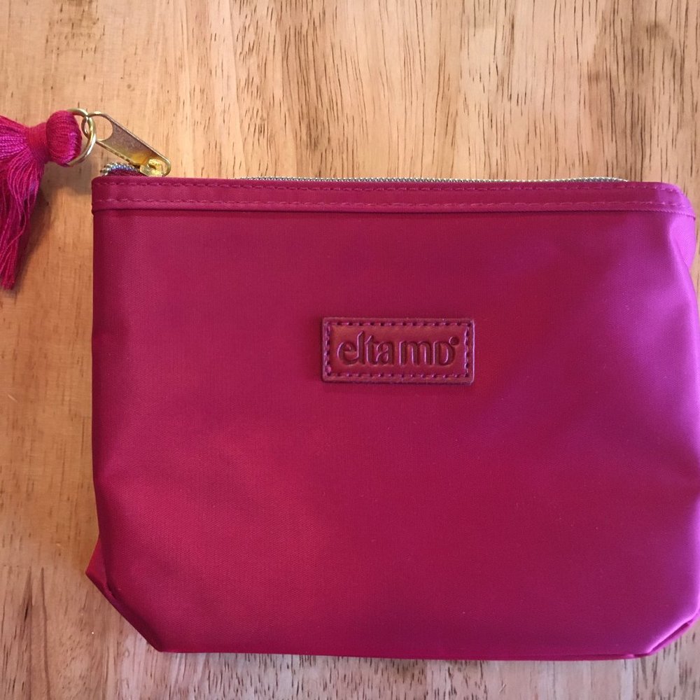 Elta hot pink pouch with tassles